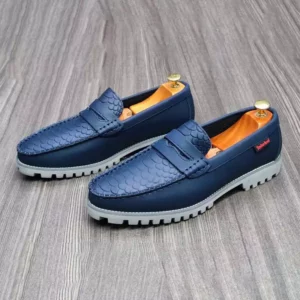 Mocassins Timberland à motif serpent en vente au Cameroun